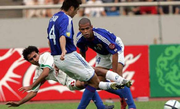 Hossein Kaebi of Iran & Endo, Santos of Japan