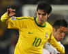 Brazil talisman Kaka skips away from Maurico Isla as the Selecao advance to the QFs (Getty Images)