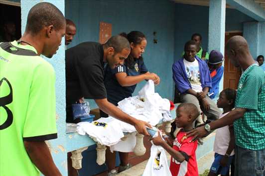 Tony Sanneh and Gloria King in Haiti