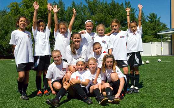 Brandi Chastain with kids (Sunlight PR)