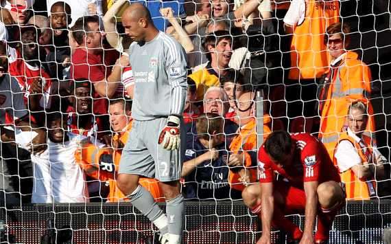 Liverpool goalkeeper Pepe Reina reacts to his own goal which handed Arsenal a point at Anfield (Getty Images) 