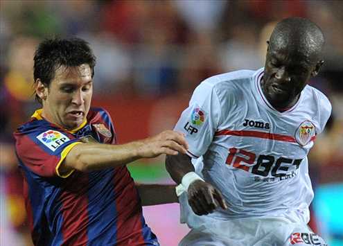 Didier Zokora, Messi, Barcelona Vs Sevilla (Getty images)