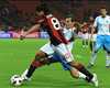 Ronaldinho tries in vain to gallp past Alessandro Potenza during Milan's 1-1 home draw against Catania (Getty Images)