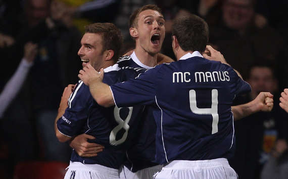 Scotland celebrate their equalising goal during 3-2 defeat to Spain (Getty Images)