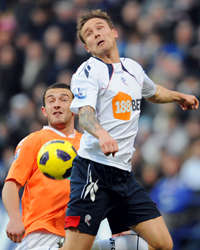 EPL - Bolton Wanderers vs Blackpool, Neal Eardley and Matt Taylor(Getty Images) 