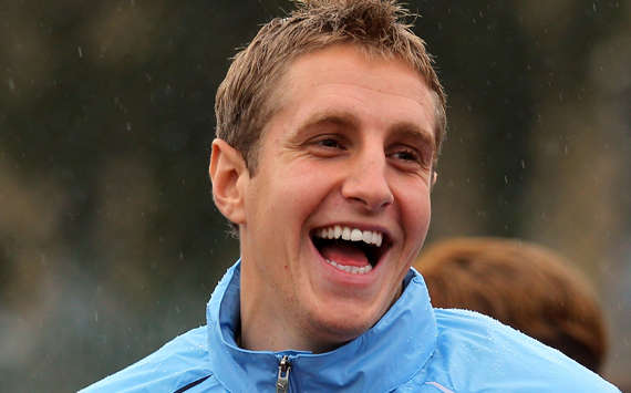 QPR beat Stoke to £10m signing of Michael Dawson from Tottenham