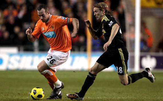 EPL :Christian Poulsen - Charlie Adam, Blackpool v Liverpool(Getty Images) 