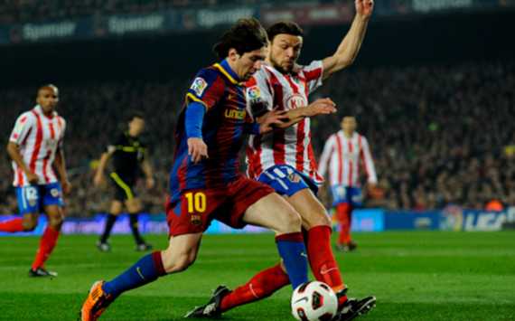 Liga BBVA: Lionel Messi, Tomas Ujfalusi (Getty Images)
