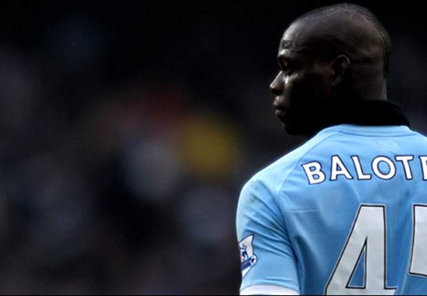 Manchester City striker Mario Balotelli caught throwing darts at youth-team players - report