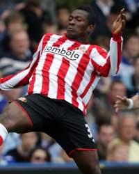 EPL - Birmingham City vs Sunderland, Stuart Parnaby and Asamoah Gyan