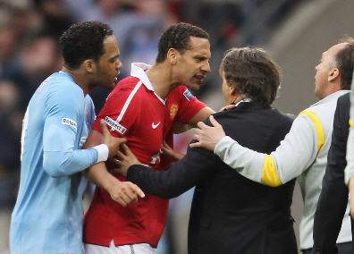 Rio Ferdinand, Mario Balotelli, Roberto Mancini, Lescott (Manchester united Vs Manchester city)