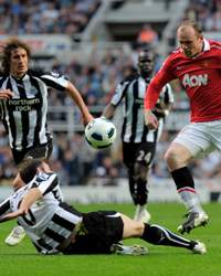 EPL, Newcastle United v Manchester United, 
Wayne Rooney and Michael Williamson  