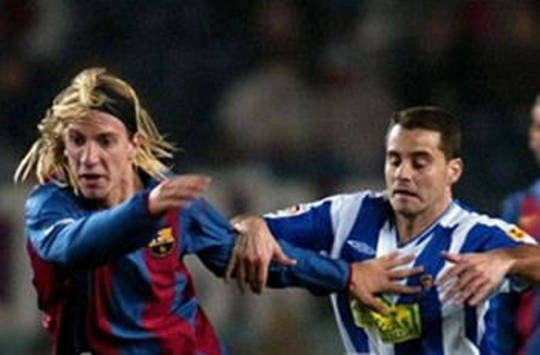 Liga: Maxi Lopez (Barcelona) and Ito (Espanyol) (AFP)