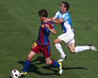 Apoño - Malaga & Sergi Roberto - FC Barcelona (Getty Images)