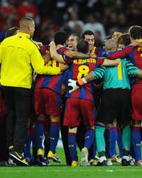 Barcelona players celebrate after victory in the UEFA Champions League final