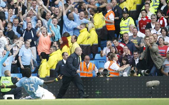 Arsene Wenger does not want to focus on controversial Emmanuel Adebayor when Arsenal face Tottenham on Sunday