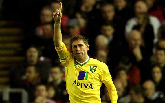 Grant Holt earns Norwich a point at Anfield