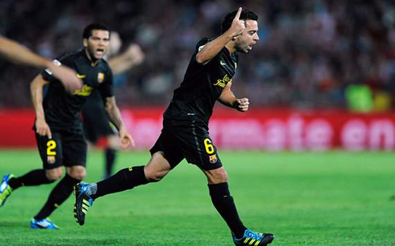 Xavi Hernández celebra su gol en el Granada-Barcelona de la Liga BBVA