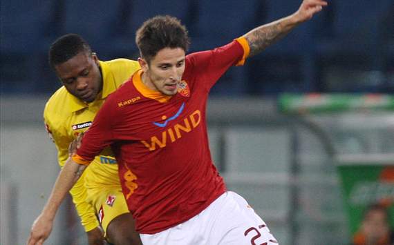 Aleandro Greco (R) of AS Roma competes for the ball with Amidu Salifu of ACF Fiorentina