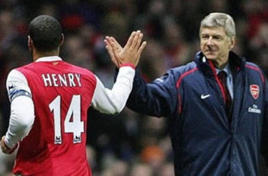 Prem: Henry celebrates with Wenger in Arsenal's 4-0 win over Charlton (AFP)