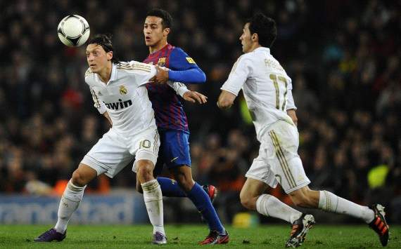 Barcelona and Real Madrid lead the race for the Champions League as the knockout stages approach
