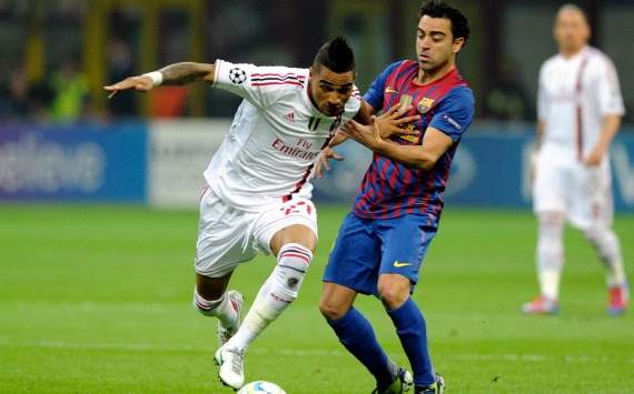 Kevin Prince Boateng and Xavi Hernandes - Ac Milan-Barcelona (Getty Images)