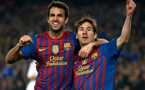 Fabregas and Messi celebrates a goal - Barcelona-Ac Milan (Getty Images)