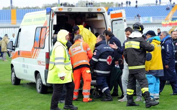 Piermario Morosoni of Livorno is transferred to an ambulance after he collapsed (Getty Images)