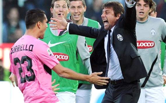 Marco Borriello celebrates with Antonio Conte his goal against Cesena (Getty Images)