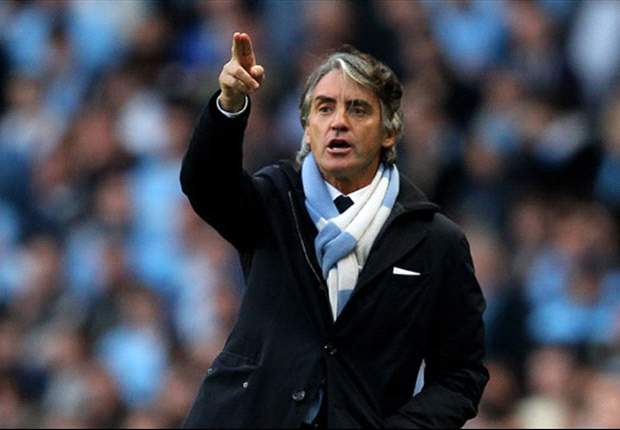 Roberto Mancini meets with Adriano Galliani at AC Milan's headquarters