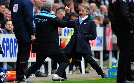 Roberto Mancini celebrates with Brian Kidd - Manchester City beat Newcastle United