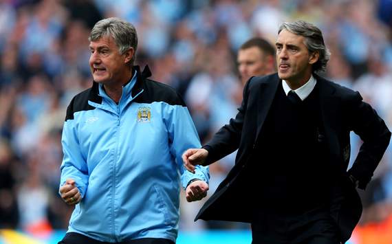 EPL - Manchester City v Queens Park Rangers, Assistant coach Brian Kidd and Roberto Mancini