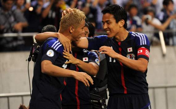 Honda helps Japan cruise past Oman