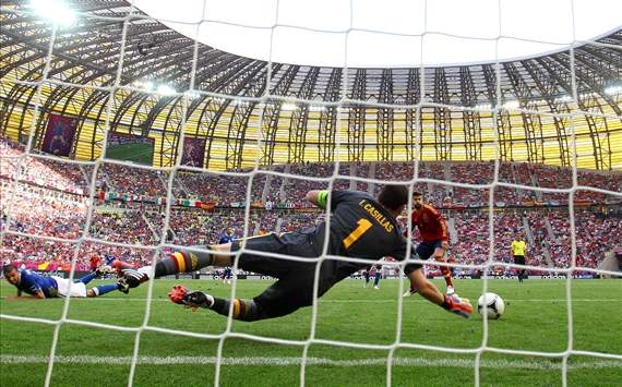 Iker Casillas makes a save during the Spain-Italy match