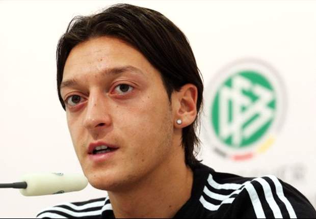 Ozil backs Low to remain as Germany coach