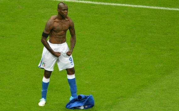 Mario Balotelli celebrates his second goal against Germany