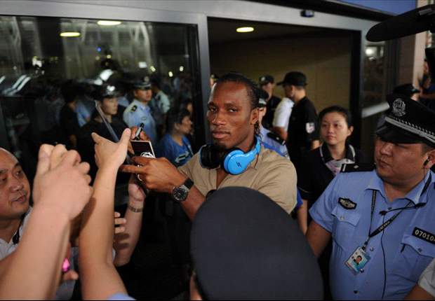 Shanghai Shenhua fans turn out in force as Didier Drogba arrives in China