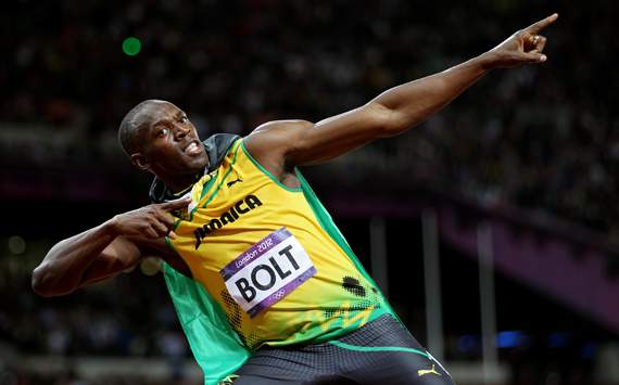 Usain Bolt of Jamaica celebrates winning gold in the Mens 100m Final on Day 9 of the London 2012 Olympic Games