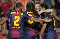 Alves, Puyol, Lionel Messi, Barcelona, Real Sociedad