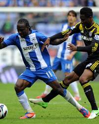 Victor Moses confronts Mikel Obi in the EPL