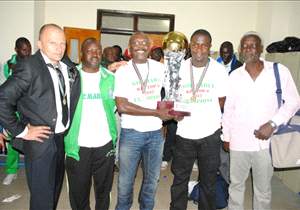 Gor Mahia chairman Rachiel and coach Logarusic with other members of the team