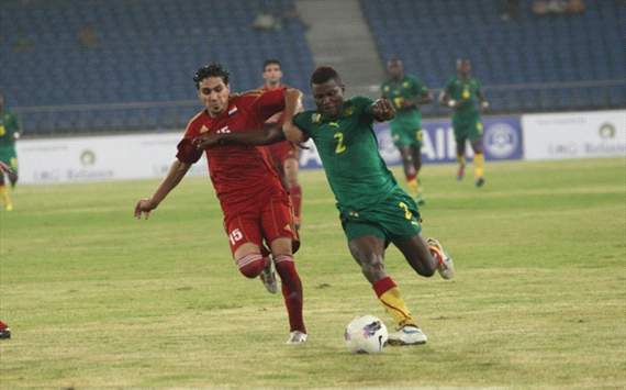 Cameroon's Momaso Joseph dribbles past a Syrian player, Nehru Cup 2012