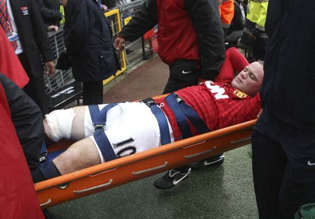 Manchester United refuse to rush Rooney return