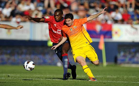 Lionel Messi; Raoul Cedric - Osasuna v FC Barcelona