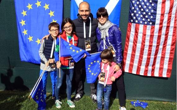 Former Barcelona football team manager Pep Guardiola and wife Cristina Serra