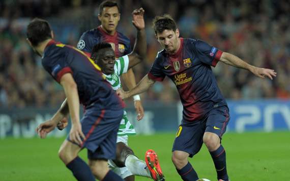 Kenya and Celtic midfielder Victor Wanyama tackles Barcelona's Lionell Messi