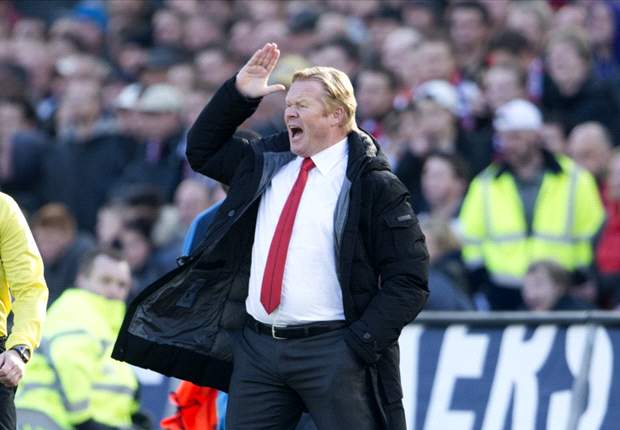 Koeman signs Feyenoord extension until 2014