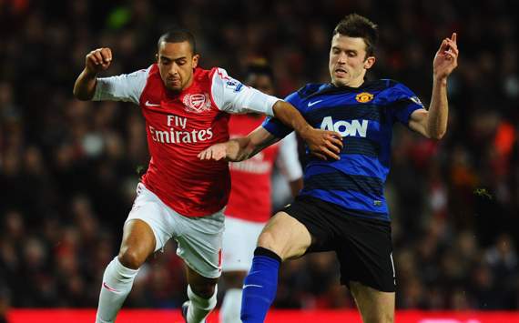 EPL - Arsenal v Manchester United, Theo Walcott and Michael Carrick