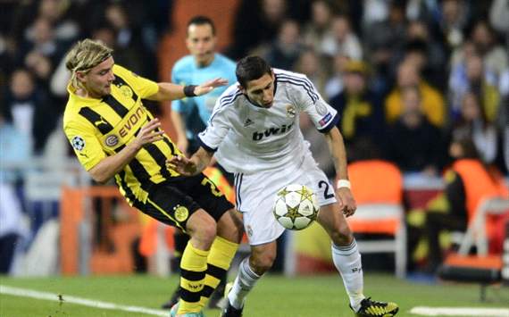 Marcel Schmelzer y Ángel Di María, durante el Real Madrid-Borussia Dortmund