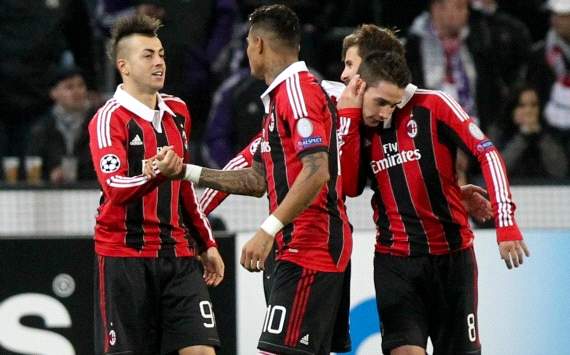 Ac Milan players celebrate against Anderlecht